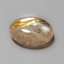Load image into Gallery viewer, Golden Rutile In Quartz Cabochon

